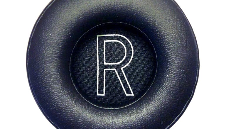 padded headphone with letter R in center