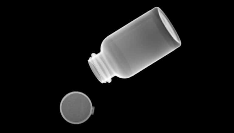 x-ray image of empty pill bottle