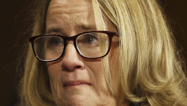 Dr. Christine Blasey Ford looks fearful and teary