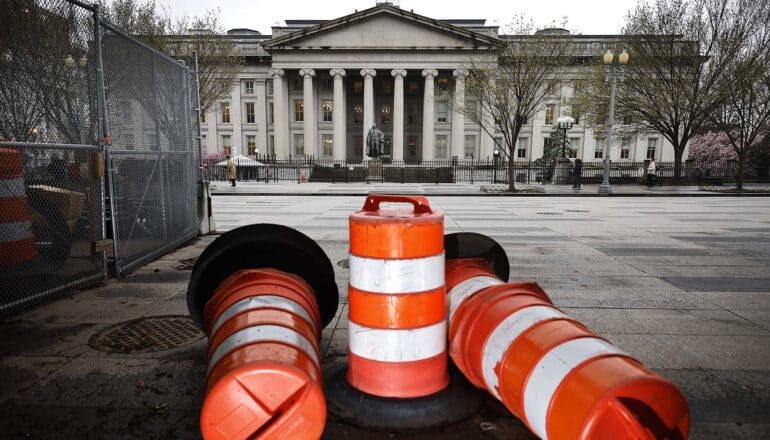 three traffic barrels in front of US Dept of Treasury