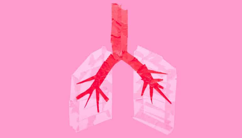 lungs made from tape on pink paper