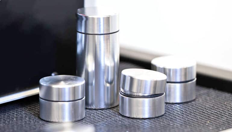 cylindrical metal containers