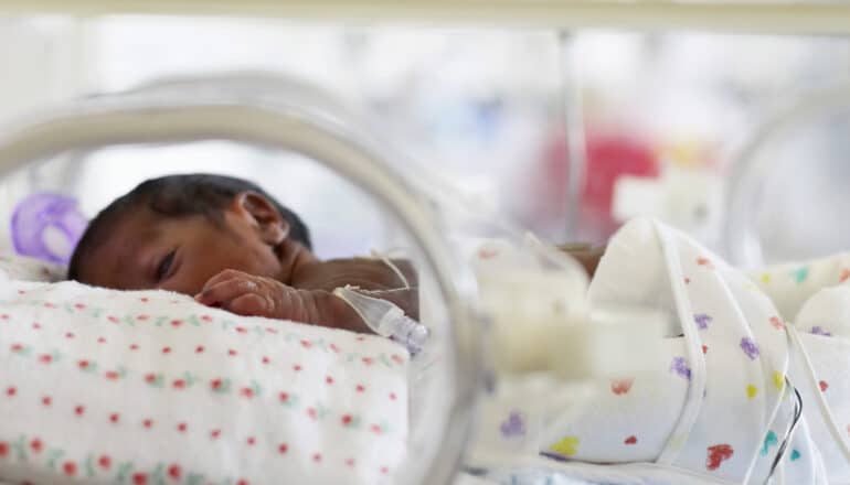 premature baby in incubator