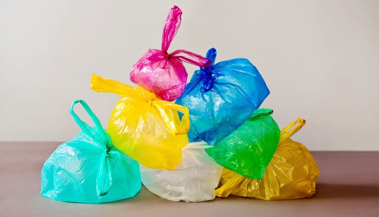 Several colorful plastic bags piled together.