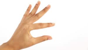 A person's hand against a white background.