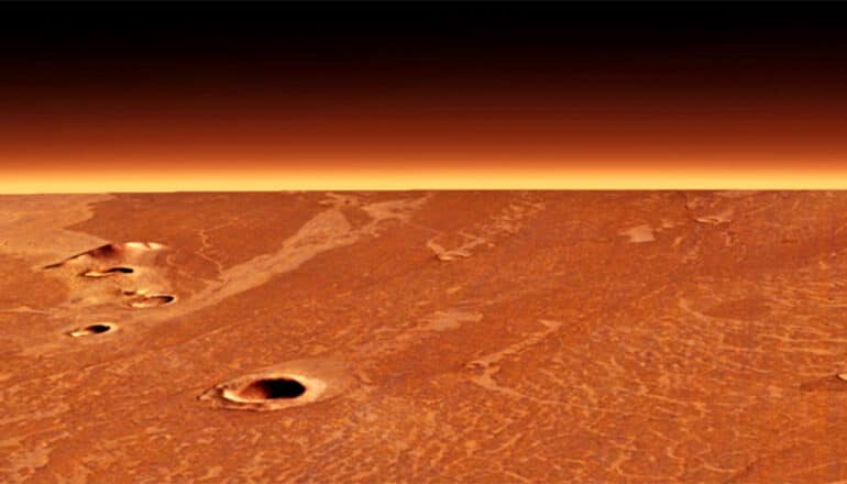 A reddish, flat Martian landscape fades into the horizon.