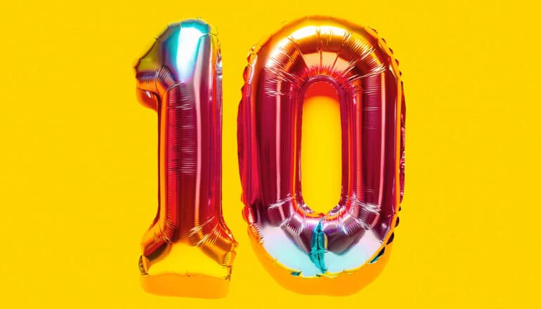 Rainbow foil balloons in the shape of the number 10.