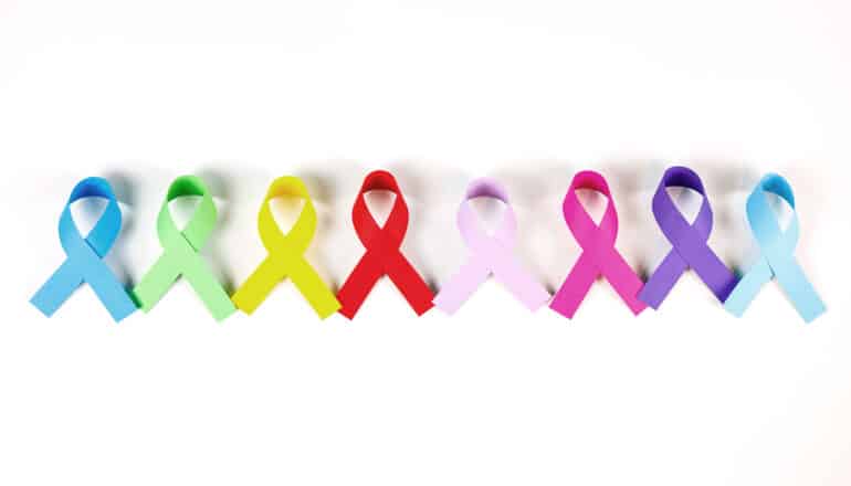 A row of colored ribbons representing different kinds of cancer.