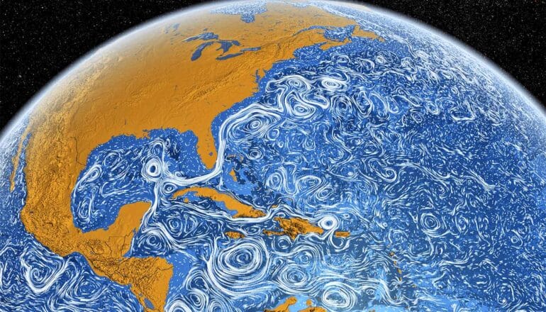 A view of Earth from space shows white swirls in the oceans.